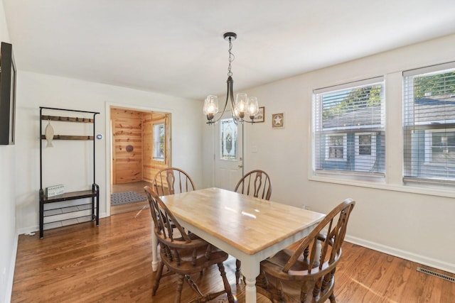 dining area featuring dark hardwood / wood-style flooring