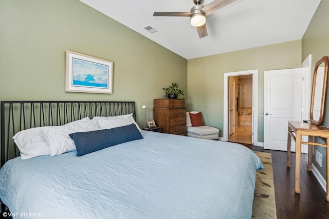 bedroom featuring visible vents, a ceiling fan, connected bathroom, wood finished floors, and baseboards