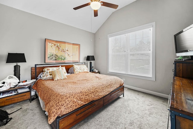 carpeted bedroom featuring lofted ceiling and ceiling fan