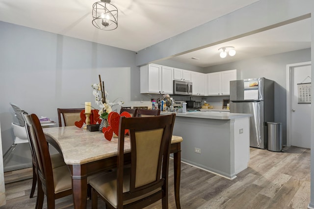 interior space with light hardwood / wood-style flooring