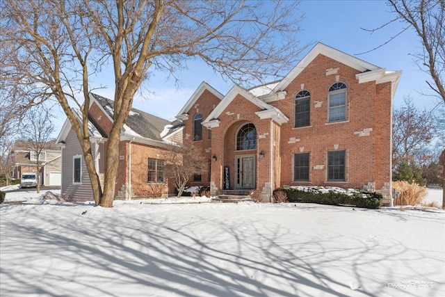 traditional-style house with brick siding