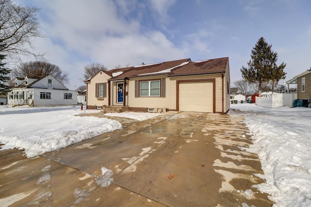 ranch-style house featuring a garage