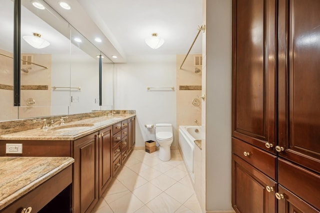 full bathroom with vanity, tile patterned flooring, tiled shower / bath combo, and toilet