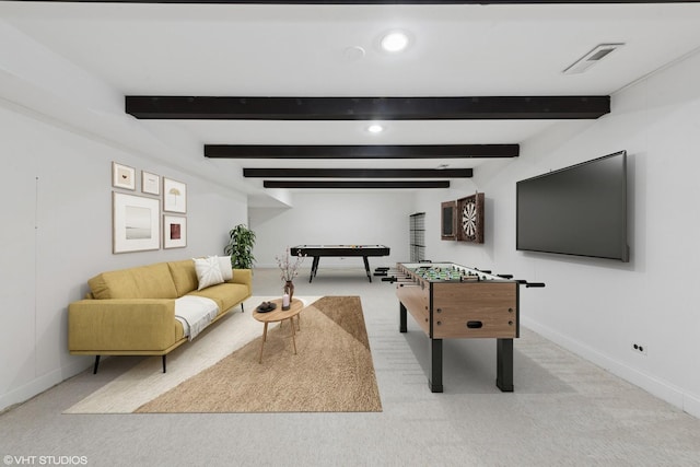 rec room featuring visible vents, beam ceiling, and carpet