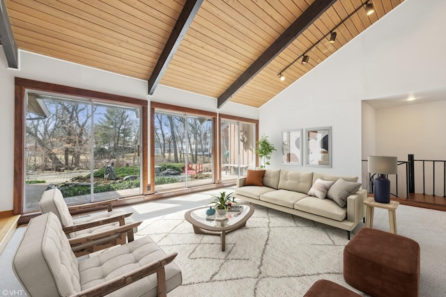 living room with beamed ceiling, high vaulted ceiling, and wooden ceiling