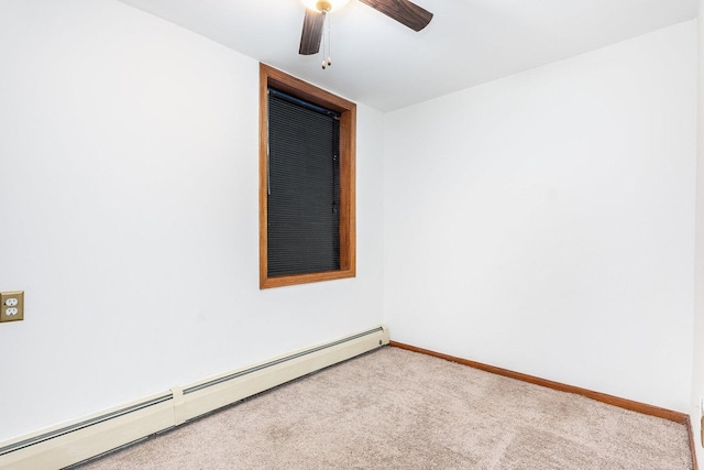 unfurnished room with carpet floors, ceiling fan, and baseboard heating