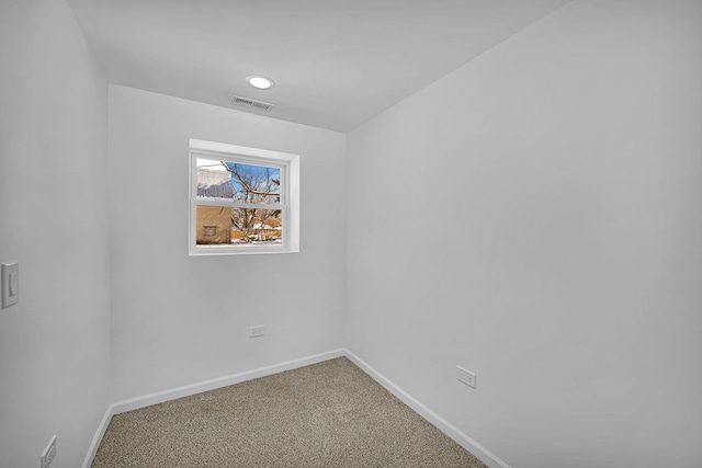 view of carpeted spare room