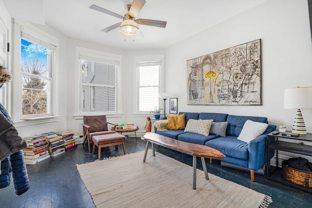 interior space featuring ceiling fan and dark hardwood / wood-style flooring