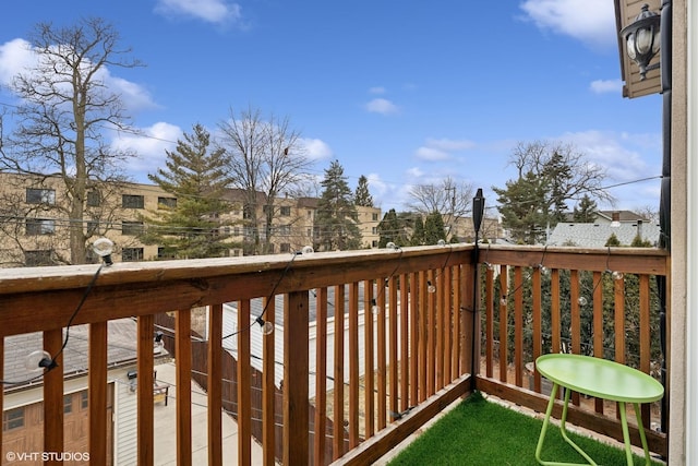 wooden terrace featuring a residential view