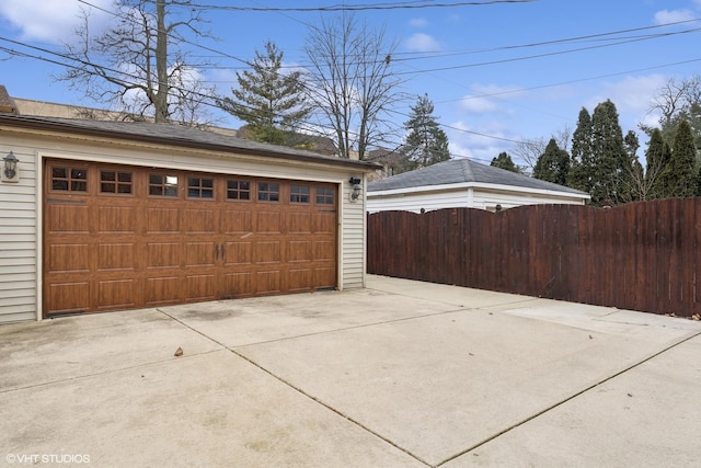 detached garage with fence