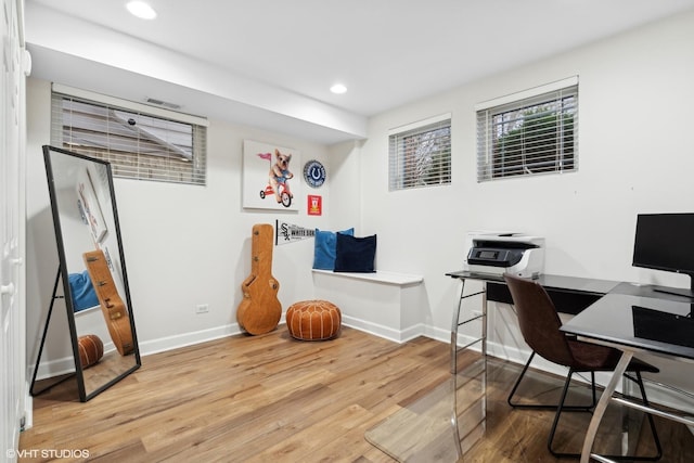 home office with recessed lighting, wood finished floors, and baseboards