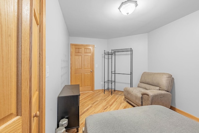 bedroom featuring hardwood / wood-style floors