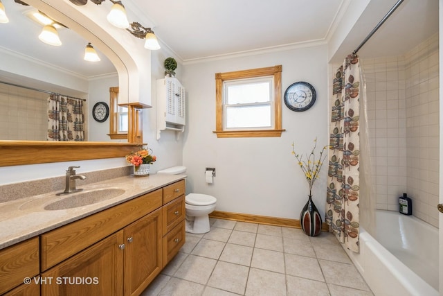 bathroom featuring toilet, ornamental molding, tile patterned flooring, and vanity