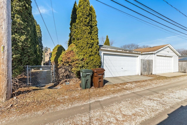 detached garage with fence