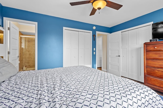 bedroom featuring multiple closets and ceiling fan