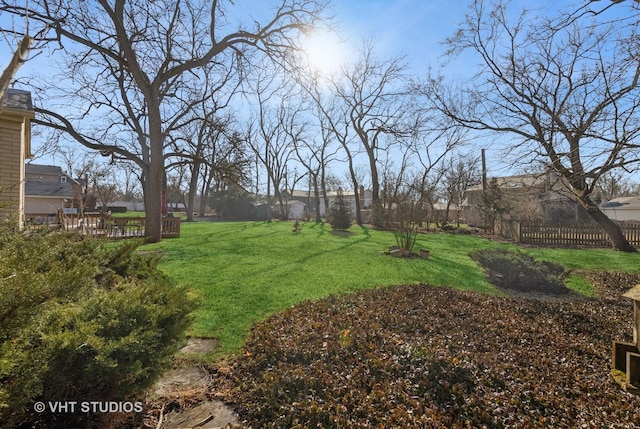 view of yard with fence