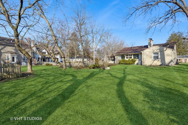 view of yard with fence