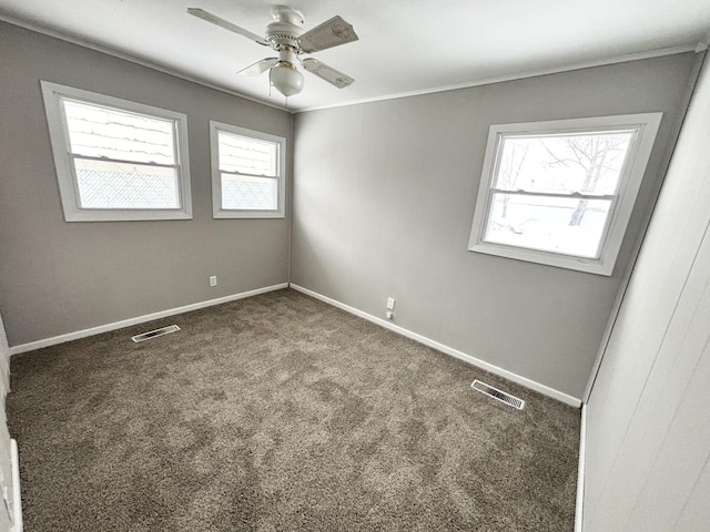 carpeted empty room with ceiling fan