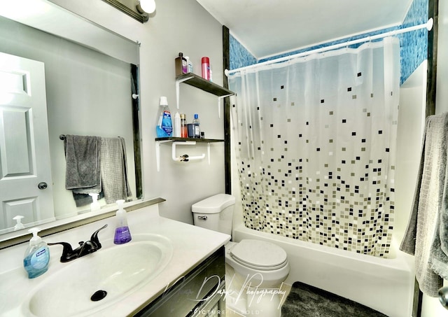 full bathroom with shower / bath combination with curtain, vanity, and toilet