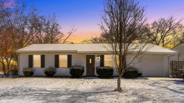 single story home featuring a garage