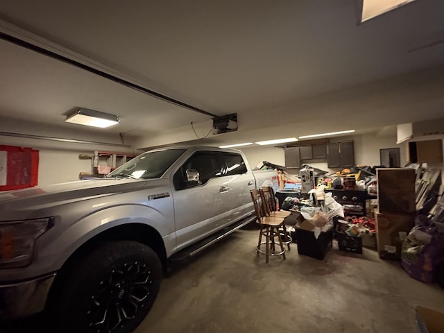 garage featuring a garage door opener