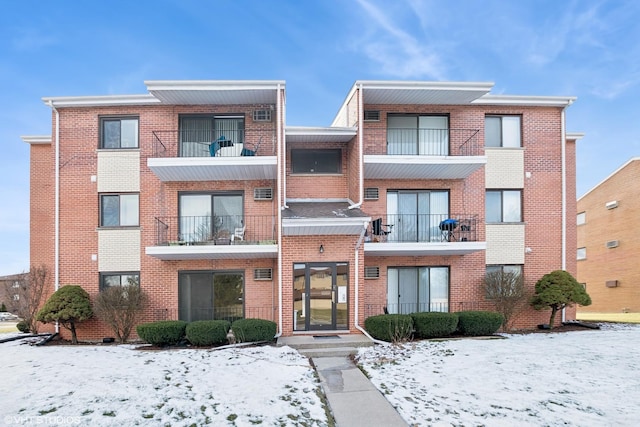 view of snow covered property