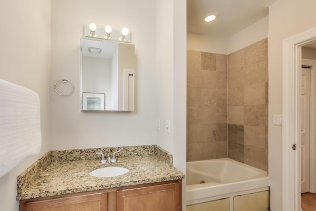 bathroom with visible vents and vanity