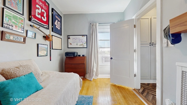 bedroom featuring light wood finished floors