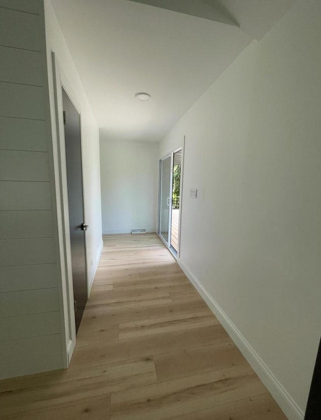 hallway featuring light hardwood / wood-style flooring