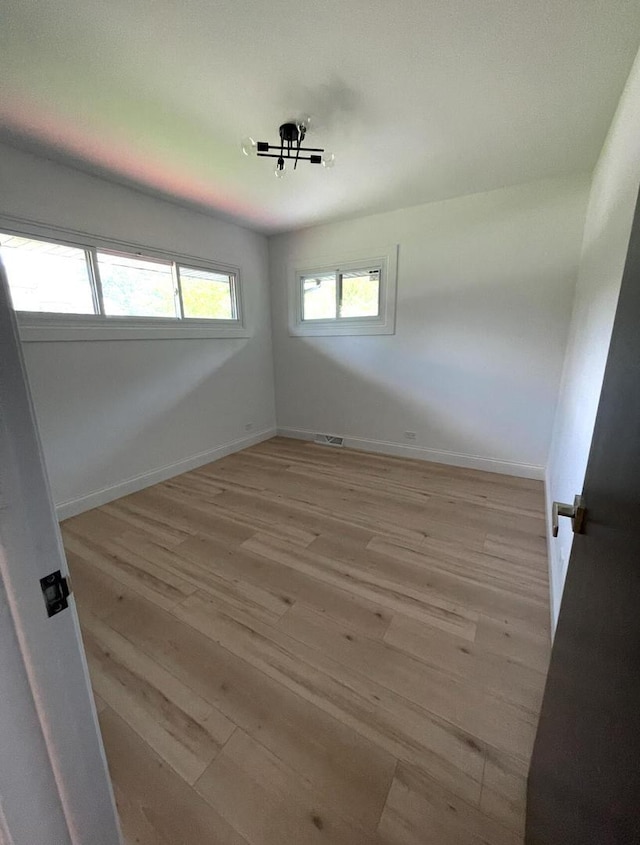 empty room featuring light hardwood / wood-style flooring