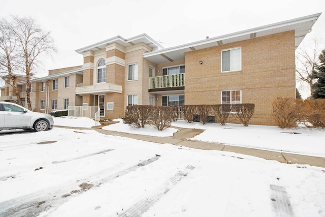 view of snow covered property