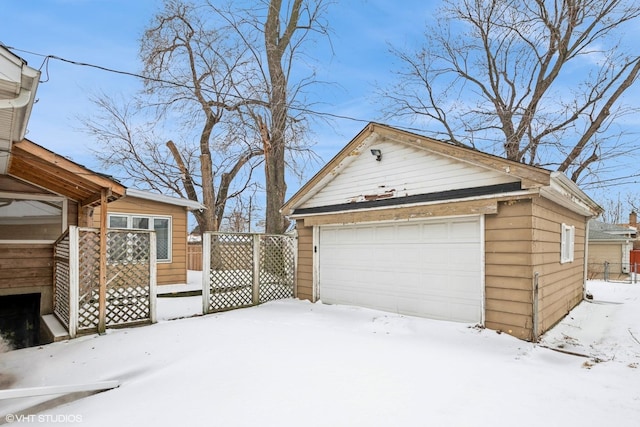 view of snow covered garage