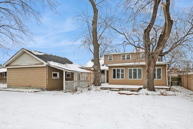 view of snow covered house