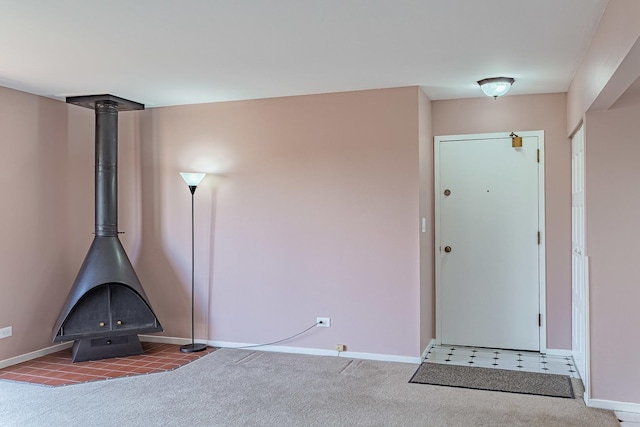 interior space featuring a wood stove