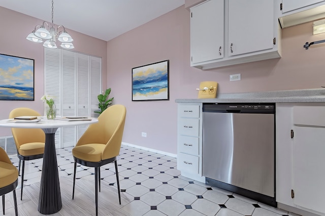 kitchen featuring an inviting chandelier, stainless steel dishwasher, hanging light fixtures, and white cabinets