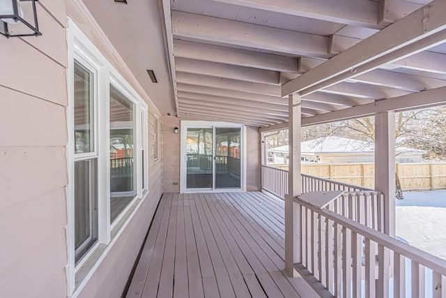 view of snow covered deck