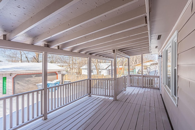 view of snow covered deck