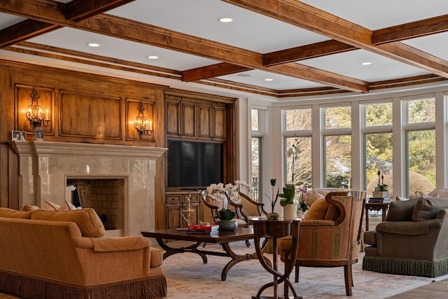 interior space with a premium fireplace, coffered ceiling, and beamed ceiling