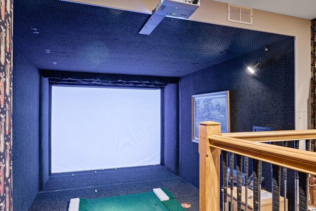 cinema room featuring golf simulator and visible vents