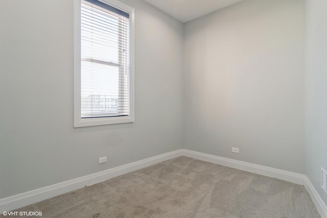 view of carpeted spare room