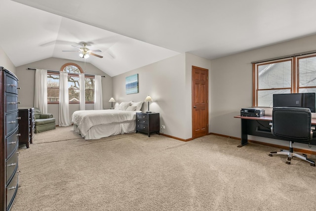 bedroom featuring vaulted ceiling, carpet flooring, a ceiling fan, and baseboards