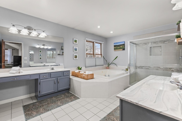 ensuite bathroom featuring a stall shower, vanity, ensuite bath, tile patterned flooring, and a bath