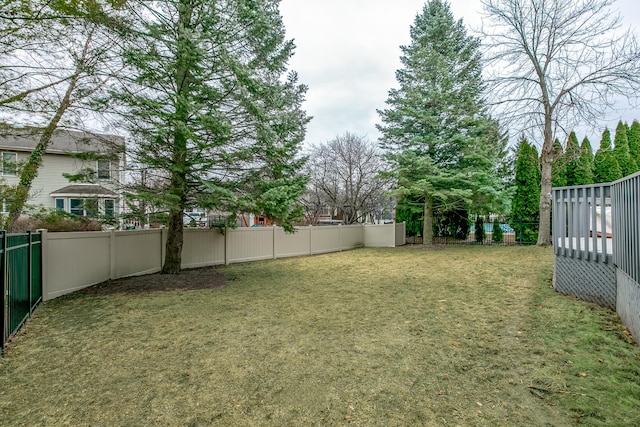 view of yard featuring a fenced backyard