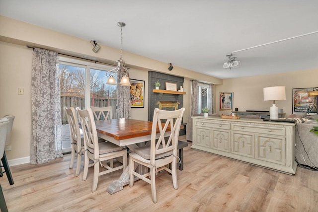 dining room with light hardwood / wood-style flooring