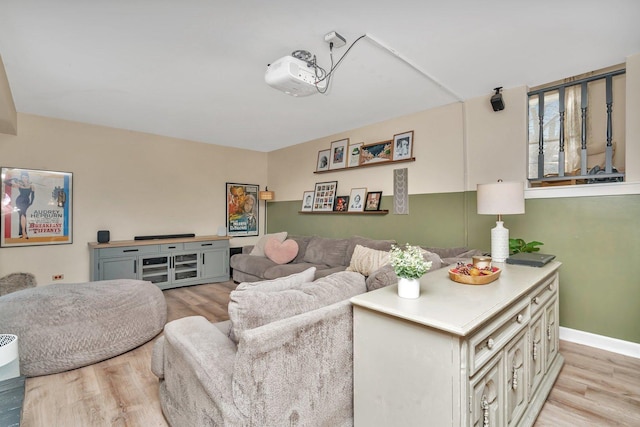 living room with light hardwood / wood-style flooring