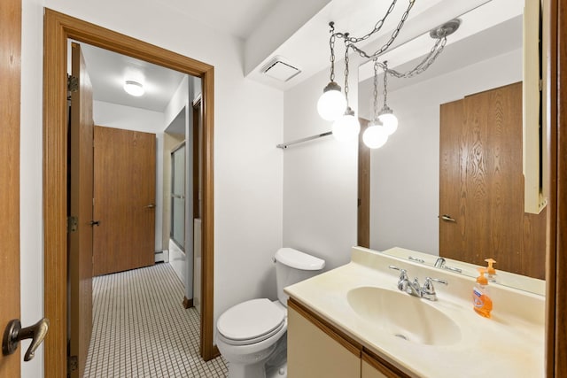 full bathroom featuring an enclosed shower, visible vents, toilet, a baseboard radiator, and vanity