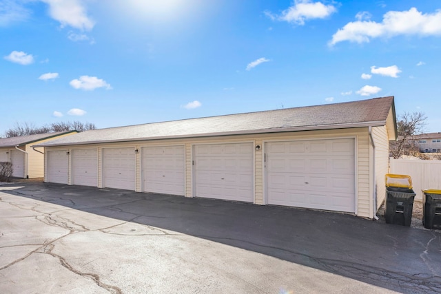 garage with fence