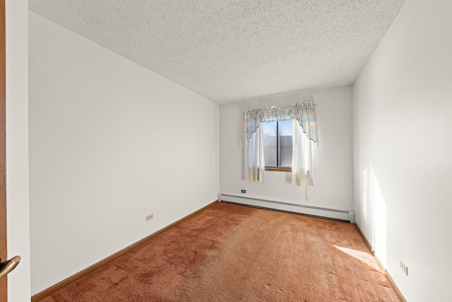 unfurnished room with a baseboard heating unit, carpet flooring, baseboards, and a textured ceiling