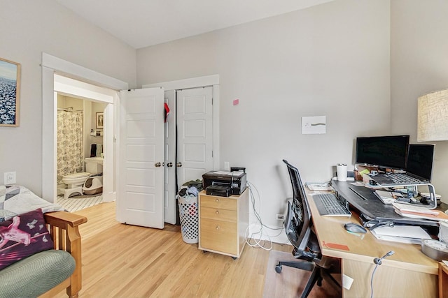 office space with wood finished floors