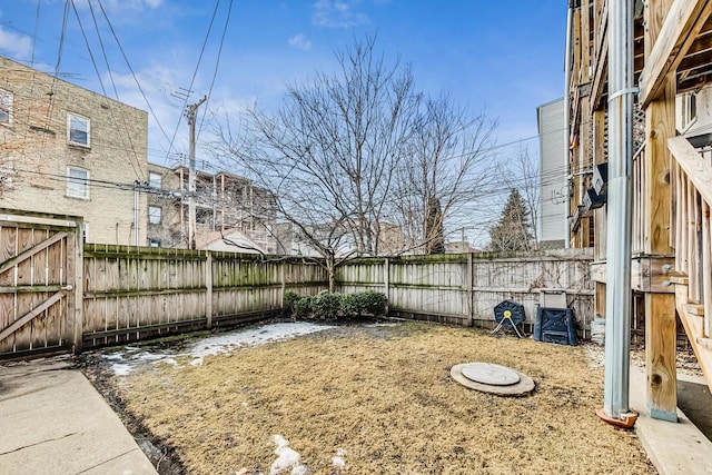 view of yard with a fenced backyard